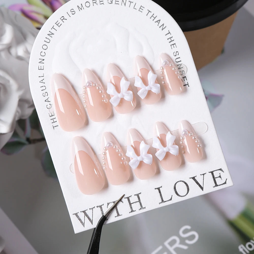 24PCS Pearl Bow Press-On Nails – Nude Pink, White French Almond, Full Cover, Includes Tools
